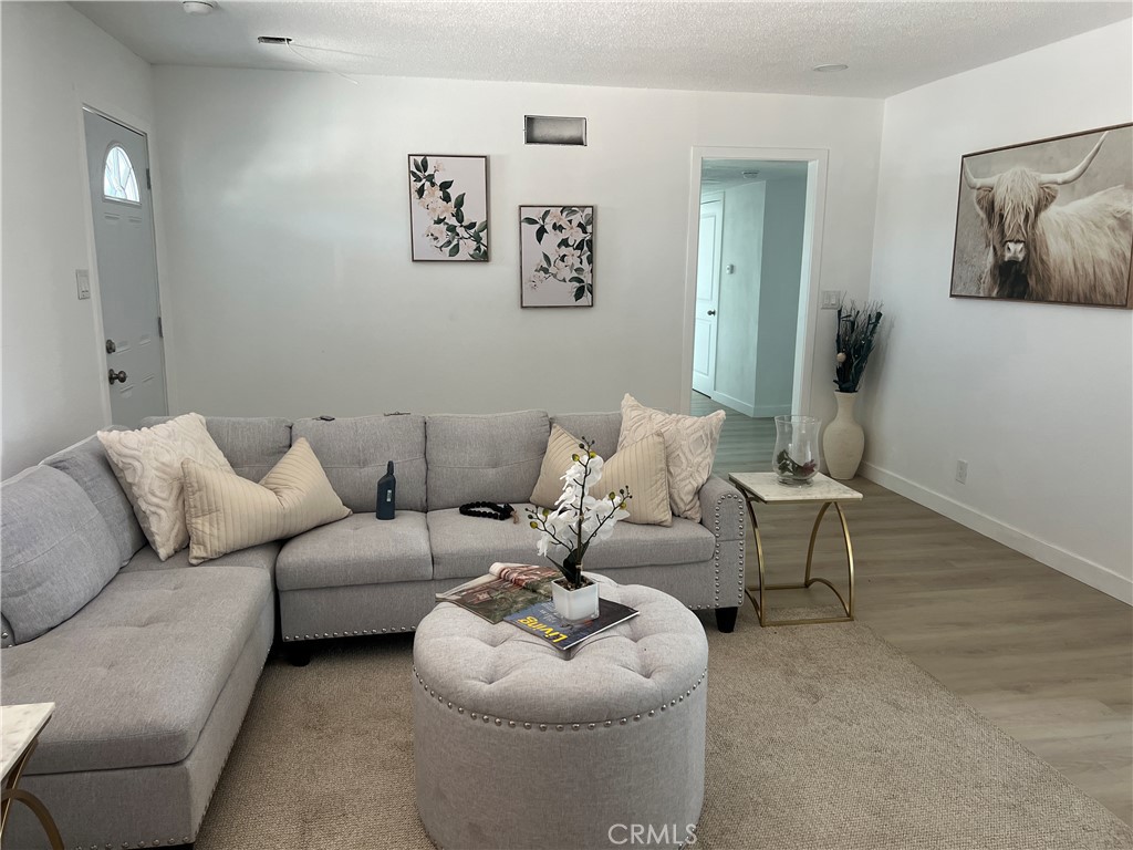 professional photos coming soon.
Exceptional Montclair Location!
Situated in a prime area just minutes from the 10 Freeway, Costco, and a variety of shopping centers, this beautifully renovated home is truly move-in ready. Every detail has been updated, including a brand-new kitchen with modern appliances, including refrigerator, washer, dryer, stove, dishwasher, microwave, stylishly remodeled bathrooms, upgraded access lighting, fresh interior and exterior paint, a new block fence, and a brand-new air conditioning system, high-end European cabinets, new windows and water proof flooring through out the whole house and much more. Don’t miss the opportunity to show your clients this turn-key property today!