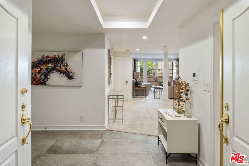 Photo of 575 S Barrington Avenue #204, Los Angeles, CA 90049 (MLS # 25610665)