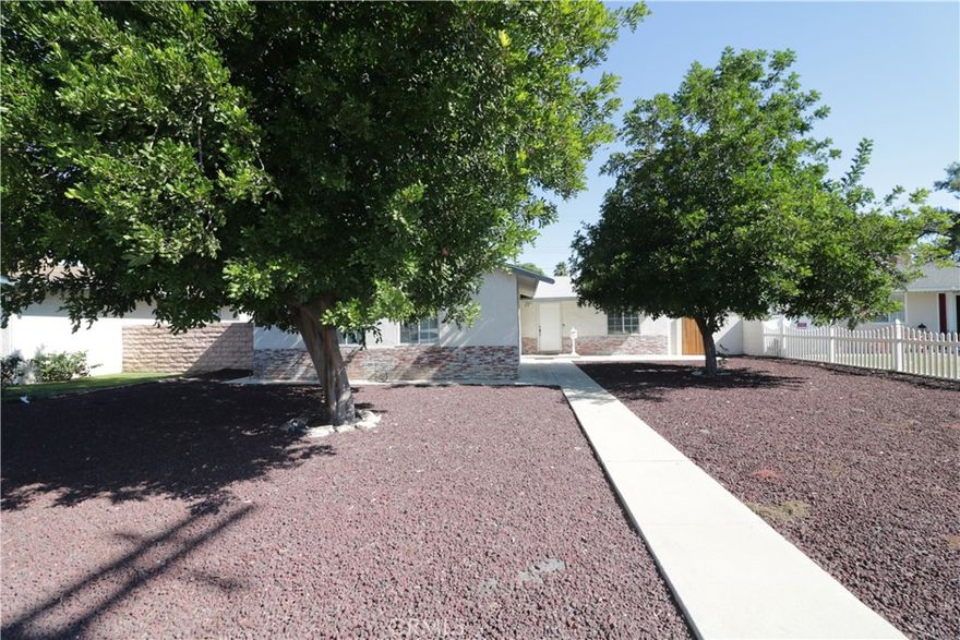 Move-in ready home in West Hills. 4 /bedrooms and 2/ baths , 1,372 sq. ft. Offers a nice open living and dining area with a cozy fireplace. The remodeled kitchen includes granite counters, ample cabinets, a large walk-in pantry, and a kitchenette area. Stainless steel appliances, including a refrigerator, gas range, microwave, and dishwasher. All bedrooms are well-sized. The home has tiled floors throughout. Fully fenced backyard with grassy and gardening area and concrete patio. 2-car detached garage and extra parking suitable for an RV or boat. The home is conveniently located to nearby Ralph's supermarket, Topanga Mall, Fallbrook Mall, Schools, West Hills Post Office and Medical Center.