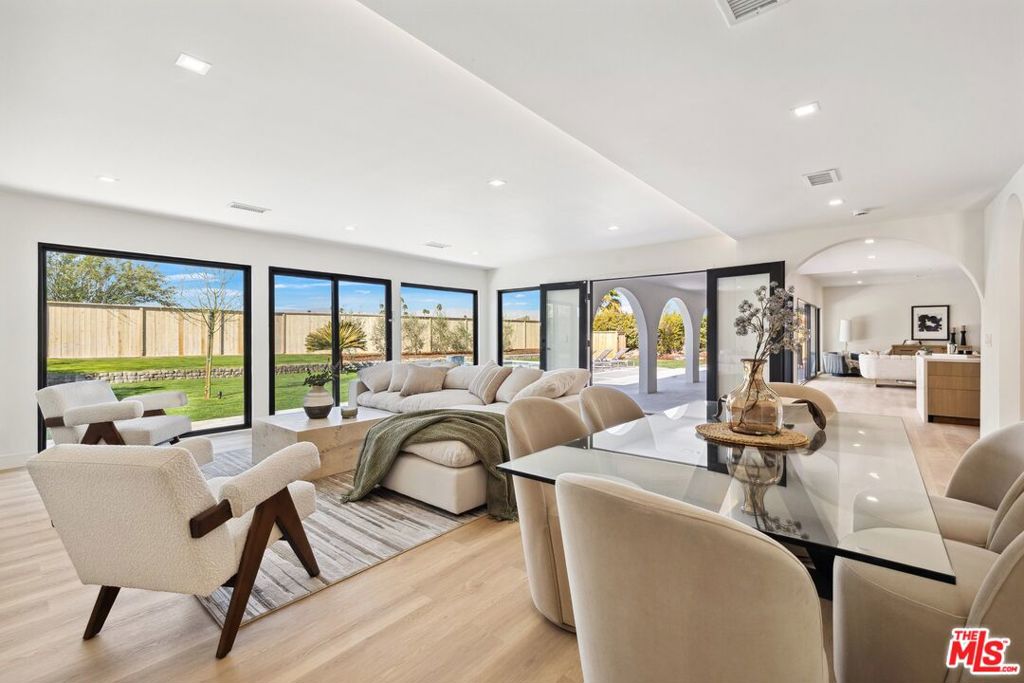 Priced to sell! This fully remodeled 2,700 sq ft home features a formal living room and a separate family room, offering a harmonious blend of style, comfort, and entertainment.Step inside to discover four spacious bedrooms and three luxurious bathrooms, providing ample space for both relaxation and entertaining. The open-concept layout creates a seamless flow between the kitchen, family room, and dining areaperfect for everyday living and special gatherings.Every detail has been thoughtfully curated to enhance your living experience, with modern finishes infused with a warm Mediterranean vibe, bringing both elegance and character to the space.Enjoy easy access to shops, restaurants, and desert activities, making this home a perfect blend of comfort and convenience.