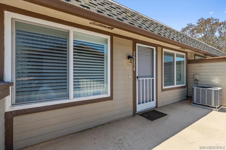 This lovely condo is spacious and well maintained.  It features new plantation shutters with complementary wood floors. No neighbors above or below. The master bedroom features a walk in closet and private vanity. Laundry space is conveniently located in the condo with linen cabinets for additional storage. Utility closet is also an added feature.  The garage downstairs provides more space for added storage or work space.  This unit is really a must see for your buyers.  Please remove shoes upon entering unit.