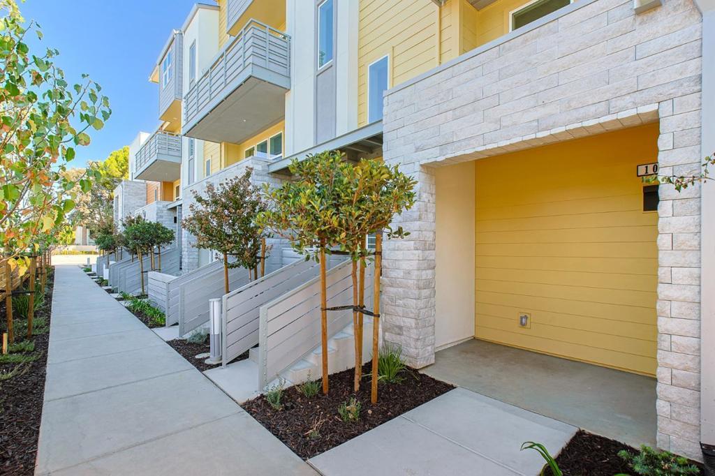 Lot 47, Plan 2 is a 3BR, 2BA new construction home at Vida in Sunnyvale. This well-appointed corner home spans ~1,415 square feet with thoughtful fixtures and finishes. Offering abundant light, the main living area and all three bedrooms are located on the second floor of the home. The main living area features luxury vinyl plank flooring and a spacious private deck off the back bedroom. The kitchen is outfitted in Bosch stainless steel appliances, quartz countertops, and a large island perfect for casual dining or entertaining. The primary bedroom offers an ensuite bathroom with dual sink vanity and walk-in closet. And additional spacious bedrooms on the same floor. This home offers energy-efficient solar panels, smart home features, and a two-car tandem garage. Vida is a new collection of 50 two- and three-bedroom energy-efficient townhomes. Open floor plan designs range from approximately 1,378 to 2,037 square feet. Vida's central location is within less than a mile of shopping and dining, as well as Fremont High School and the Sunnyvale Community Center Park. Please note that the images are artist renderings representative of the community and do not reflect the actual home for sale.