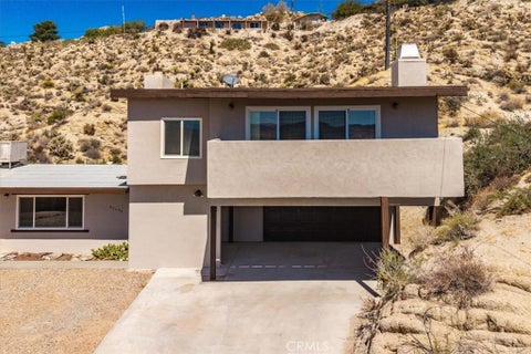 Photo of 57460 Airway Avenue, Yucca Valley, CA 92284 (MLS # JT26208723)