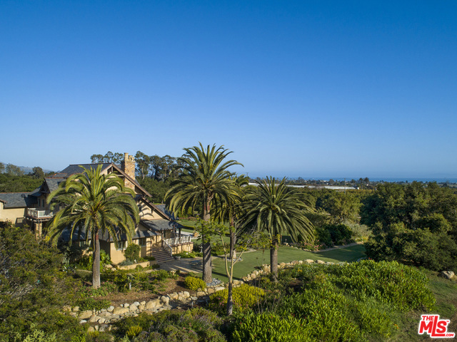 Imagine the possibilities! HeartStone Ranch is a 12-acre estate property located on the Santa Barbara coast and it offers an unprecedented lifestyle, just moments from the beaches of Padaro Lane and the charming villages of Carpinteria and Montecito. This beautiful property is entirely usable with gently sloping acres of green pastures for horses or an ideal location for an orchard or vineyard, all irrigated with a private well and 2" agriculture meter. Expansive lush lawns are surrounded by stonewalls, rose gardens, ancient oaks, towering palm trees, an outdoor kitchen with fireplace and a koi pond with waterfall. There is an arena, round pen & 2 rustic, romantic barns. A Guest House & ranch manager's home add to the versatility of the property. With 360 degree vistas, this incredible ocean and mountain view property, offers limitless possibilities as a country home, organic farm, vineyard, equestrian facility, car collectors dream, a private family compound or a corporate retreat.