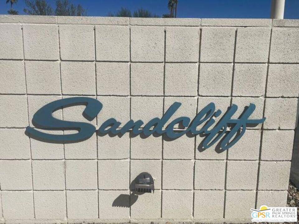 Sandcliff is the first multi-family historic district in Palm Springs to join National Register! Sandcliff is one of the finest and most intact examples of a mid-century condominium complex in South Palm Springs! This home is the perfect full-time or vacation getaway property. The 40-units of Sandcliff were developed by the Berkeley Square Company and designed by Sherwin L. Barton. Sandcliff is a superb example of "Desert Modern" architecture and the "lifestyle" condominium complexes that became so popular. Sandcliff has remained remarkably steadfast since the completion of its construction in 1964. Sandcliff is designated as an official historic landmark (Class 1), and eligible for The Mills Act Program that may have economic incentives to empower owners to reinvest tax savings into the preservation and restoration of their cherished historic property. Two community pools and one spa. The HOA provides maintenance of the grounds. This unique corner 2 BD, 2BA, 1769 SQ FT unit is flooded with natural light boasting mountain views. As you enter the home you are greeted by an open floor plan which is great for entertaining and experiencing the modern lifestyle, as well as enjoyment of desert indoor/outdoor living with 3 private patios. The large primary bedroom has an en-suite bathroom as well as a private patio. Close distance to grocery stores, restaurants, and shopping. This complex has a 28 day minimal rental rule. Furniture available for purchase outside of escrow. Storage is in front of unit parking space. HOA FEE: $575/Monthly