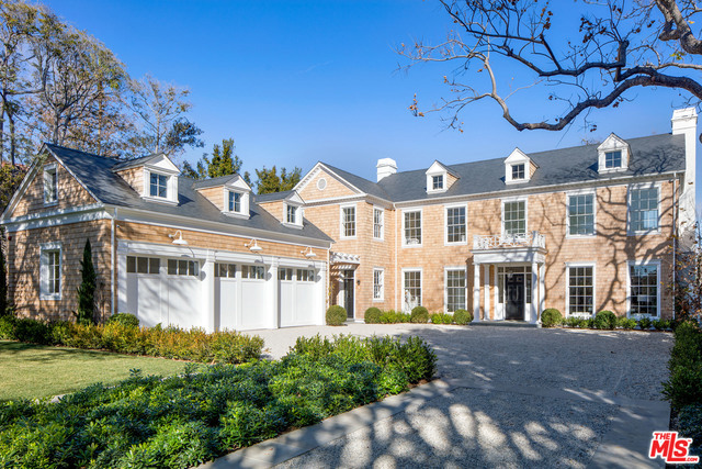 Brand new Modern Georgian Estate on pvt 35K+ sq ft tree-filled lot w/ deep setback, expansive flat pad & lovely vistas on qt & picturesque North Carmelina - one of BW's finest streets! Painstakingly designed & built over a 4-year + period. Grt st presence, huge custom windows, tall sun-filled spaces, refined detailing, extensive millwork, the most tasteful finishes imaginable, perfect floor plan & breathtaking gardens w/ true resort-like feel. Gracious FLR & FDR, expansive eat-in chef's kitchen/fam rm, sep complete catering/prep kitchen, inviting lib, adult fam rm w/ marble bar, lg scale theatre space, laundromat-sized laundry rm/staff kitchen, upstairs laundry rm, gym, mudrm & det GH/poolside cabana w/ BA. Bluestone terraces & beau grounds inc pl/spa, field-size lawn & gorgeous canyon setting. Hardwd flrs which are unique to each rm, beau light fixtures & hardware thru-out, furniture grade built-ins, outdr FP, fire pit, fountain, outdr shower, BBQ and spacious 3 car-garage. Special!