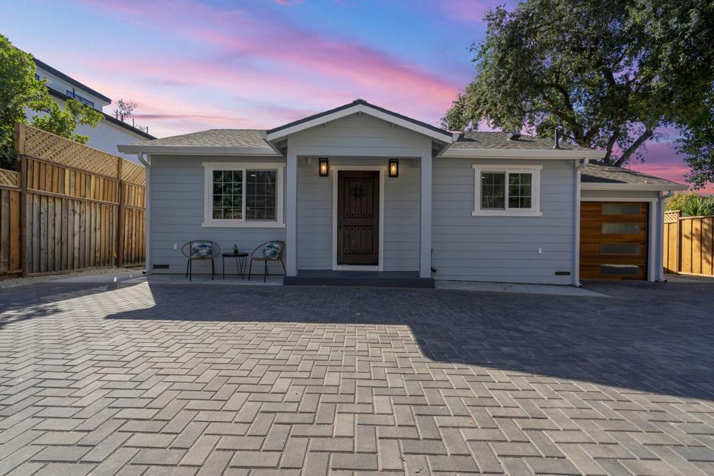 Move in and enjoy this stunning, fully renovated and expanded single-story home on a spacious, private lot in Los Gatos. Completely renovated & expanded with designer touches. Bright, open living area with gleaming floors. Chef's kitchen with oversized island featuring seating for causal dining and entertaining - perfect for family meals and hosting friends. Gorgeous countertops, skylight, high-end stainless steel appliances & soft-close cabinetry. Dream primary suite with sliding doors to backyard & spa-like bath with walk-in shower and dual sinks. Spacious secondary bedrooms & beautifully updated bathrooms. All-electric design with sustainable, future-ready upgrades: modern electric cooktop, heat pump water heater, heat pump HVAC, and energy-saving LED lighting. Fully insulated walls (including interior) for maximum comfort & efficiency. Great storage throughout. Attached garage + oversized paver driveway. Exceptionally private front yard, ideal for kids & pets. Room to expand or build an ADU for rental income or multigenerational living. Peaceful cul-de-sac near golf course. Award winning schools: Marshall Lane Elementary, Rolling Hills Middle & Westmont High.