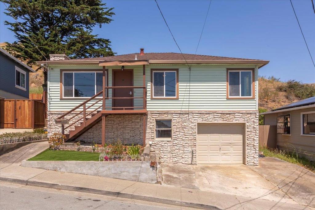 Enjoy comfortable and convenient living in South San Francisco's desirable Paradise Valley neighborhood. Prime location near Martin Elementary School, Hillside Recreation Center, Paradise Valley Playground and the scenic trails of Sign Hill Park. Easy access to freeways, SF Airport, Silicon Valley and San Francisco. Conveniently located just minutes from the biotech hub, Costco Business Center and bustling Grand Avenue restaurants, shops and businesses. Lots of natural light with a view of the Bay from the living room as well as 2 bedrooms. Living Room with Free standing cast iron gas stove insert, Kitchen with flat surface countertops, gas range, dishwasher and disposal, Dining Area with slider which leads to the exterior deck and spacious backyard, Laminate flooring, Laundry area in the basement, Enclosed sunporch which is an ideal space for a den or extended living area, One car garage with ample space for a workshop or extended storage area and much more!