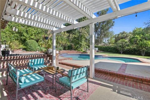 Photo of 7332 E Grovewood Ln, Orange, CA 92869 (MLS # PW25232864)