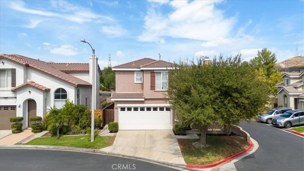 Lowest price in the neighborhood!!! Close to shopping, restaurants and freeways. CORNER LOT, ONE NEIGHBOR, and MOVE IN READY. Enter to an OPEN FLOOR PLAN with a FORMAL DINING AREA , SOARING HIGH CEILINGS and HARDWOOD FLOORING throughout the downstairs. The living room is OPEN TO THE KITCHEN with TONS OF LIGHT and a COZY GAS FIREPLACE. Your kitchen has GRANITE COUNTERS, Breakfast bar, and a HUGE PANTRY. UPSTAIRS you have a massive primary bedroom with on-suite bath, WALK IN CLOSET and TONS OF STORAGE, TWO LARGE BEDROOMS and UPSTAIRS LAUNDRY YIPPEE!!!. Don't miss the BONUS AREA...perfect for a HOME OFFICE. The backyard is perfect for gatherings. You also have DIRECT ACCESS to the home from the two cararage.