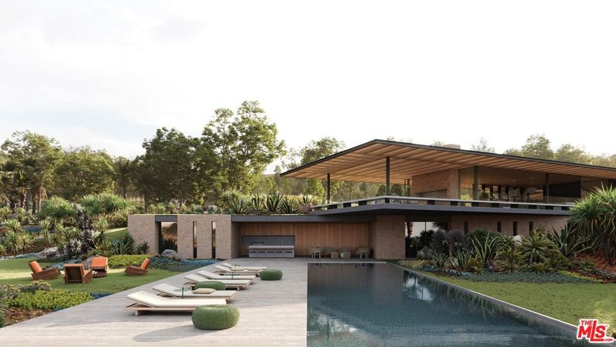 Inspired by the serene spirit of Little Dume Beach, Deerhead Ranch by Jacobsen Arquitetura has been symbiotically designed to meld with Malibu Park's verdant natural environs. Set upon a 2.3-acre lot, the 11,343-square-foot residence is strategically positioned towards the ocean and setting sun. The two-story home cascades into the lush terrain and comprises five bedrooms, nine bathrooms, a wellness center, gym, media room, and guest house, all finished with earthy stone, warm woods, glass, and handsome metals. Open-concept kitchen, dining, and living spaces seamlessly extend to a natural pond and a cantilevered deck perfectly perched overlooking the 100-foot-long pool, gardened rooftop, and ocean vistas. The 350-foot driveway culminates in a motor court capable of accommodating 20 vehicles, in addition to the three-car garage. Amongst the verdant grounds is a sport court ideal for the racquet sport of your choice. Only months away from being able to break ground on the only home on the West Coast designed by Jacobsen Arquitetura.