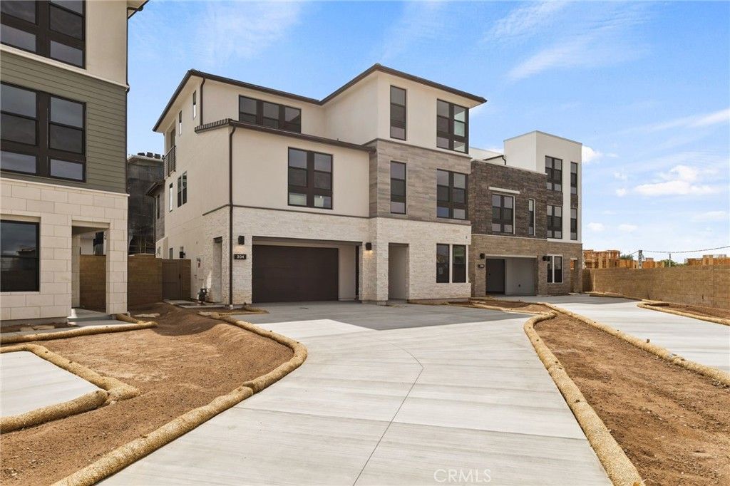 Photo of 204 Stage, Irvine, CA 92618 (MLS # OC25268401)