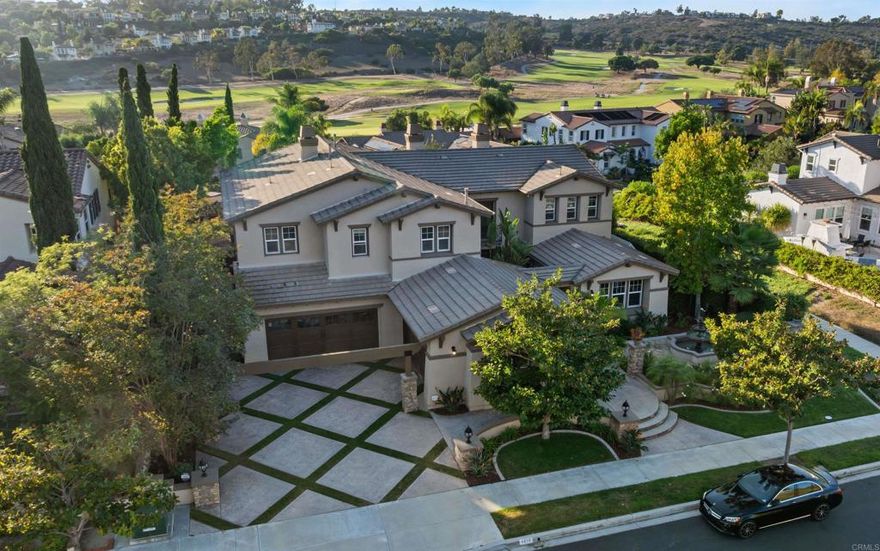Welcome to this rare luxury estate in the prestigious La Costa Greens, Carlsbad — now professionally reimagined and newly restyled. Nearly 5,000 sqft of refined living space is nestled on a quiet cul-de-sac with panoramic views of the world-famous La Costa Golf Course, offering the ultimate in privacy, scale, and elegance. 6 bedrooms, 4.5 bathrooms,  4,913 sqft interior, 10,358 sqft lot Private downstairs suite ideal for guests or multigenerational living. Expansive chef’s kitchen with oversized island, custom cabinetry, marble finishes, and professional matching appliances. Grand primary suite featuring a dedicated study, marble-clad bath and vanity, a luxurious oversized spa tub, a generously sized walkthrough closet, and a walk-in shower. Elegant interiors with marble and rich wood flooring throughout. Built-in premium surround sound system throughout both levels — with a state-of-the-art setup in the living room that delivers a true home theater experience. Spacious built-in office on the main floor, featuring custom cabinetry and a hidden fold-out Murphy bed — perfect for guest accommodation or a private workspace. Signature, professionally designed water features in both the front and rear yards — luxurious fountains that provide a resort-quality ambiance and reflect a significant custom investment. Resort-inspired backyard featuring an outdoor fireplace and an outdoor kitchen with a brand-new built-in BBQ grill and refrigerator — never used and custom-installed exclusively for this home — surrounded by lush landscaping. 2 separate 2 car garages giving you plenty of parking + oversized motor court with parking for 4+ cars. No front or rear neighbors — open views and unmatched privacy.  Community highlights: enjoy the perks of La Costa Greens’ private clubhouse, pool, gym, parks, and trails. Plus, the home is within walking distance to Alga Norte Community Park — Carlsbad’s largest and most complete park with aquatic center, sports fields, dog park, and community events.  From serene mornings on the balcony with refreshing ocean breezes to vibrant evenings entertaining in your expansive outdoor oasis — this home is designed for luxury living at every turn. Last year, the identical floorplan in this community sold for $3.95M. Now offered at $2,899,000, presenting an extraordinary opportunity in today’s market.  REMARKABLE, RARE OPPORTUNITY TO LEASE OR BUY! Property offered fully furnished, partially furnished, or unfurnished.
