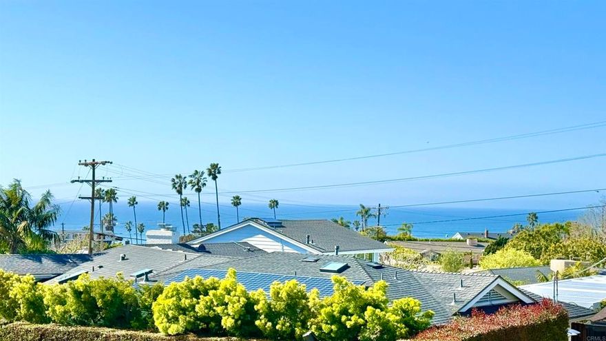 - OCEAN VIEWS. WALKING DISTANCE TO PUBLIC & PRIVATE SCHOOLS. PICTURESQUE. SOLAR. BEAUTIFUL LANDSCAPING. SKYLIGHTS. - Beautifully maintained single-story 4-bedroom, 3-bathroom home nestled within the prestigious Muirlands neighborhood of La Jolla. - Easy walk to top-rated Muirlands Middle School & La Jolla High Schools. - Close to La Jolla Elementary School. - 3 other private schools nearby, including Bishop's School, Bird Rock School. - Newly updated home offers spectacular serene ocean views from the kitchen, dining room, living room, and bedrooms. - Newer paint inside and a brand new AC unit. - The large chef's dream kitchen opens up to the family room and features a pantry, high-end stainless steel appliances as well as an oversized quartz island. - Vaulted ceilings, great floor plan, and large rooms, with ceiling fans. - Situated on a 0.28-acre lot with a gorgeous backyard, new deck, basketball court, large fishpond, manicured landscaping, and trees that provide an atmosphere of tranquility. - The second living room could be used as a den/gym, with plenty of sunlight, facing the backyard. - Extra-large master bedroom with plantation shutters to filter the light, two closets, and an ensuite bathroom featuring dual sinks, a standing shower, and a bathtub. - Another ensuite bedroom is separate from all other rooms, featuring its own bathroom and separated by the second living room. - Skylights in the bathrooms. Built-in wall closet/bookshelf. - Paid-off 4.2 KW solar power system and EV charger. - Just a short walk down Nautilus to world-famous Windansea Beach. - Only 5 minutes to the Village for world-class shopping and dining.  - GARDEN SERVICE INCLUDED. - DO NOT CALL - SEND MESSAGE VIA LISTING SERVICE.