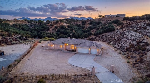 Photo of 6890 Oak Hill Road, Oak Hills, CA 92344 (MLS # IV26197082)