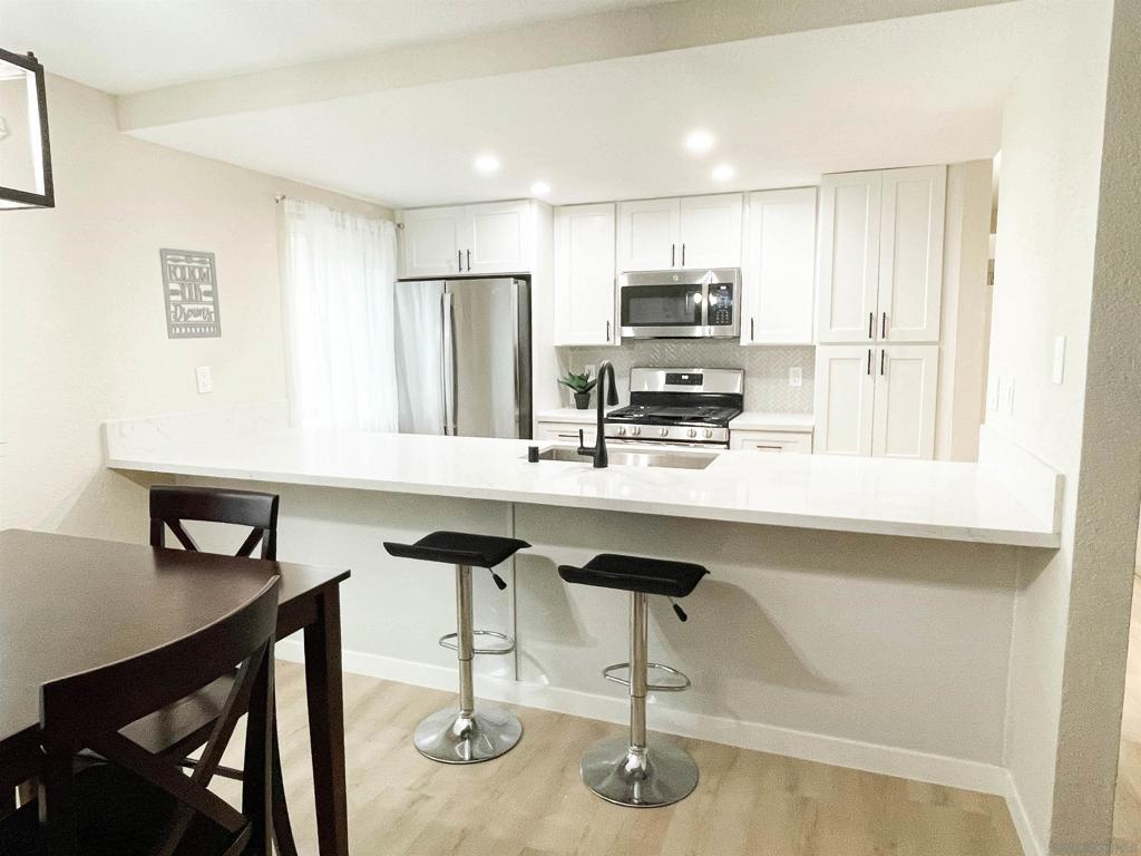 Beautifully renovated home with 2 off-street parking spaces and in-unit laundry! Step into this newly renovated 2-bedroom, 1.5-bath gem located in the heart of Golden Hill. New cabinets and new Quartz countertops in kitchen and baths! New waterproof luxury vinyl plank throughout home, new windows and paint, new stainless steel appliances, new stainless steel kitchen sink and countertops, new cabinets in baths and kitchen, new light fixtures, new plumbing fixtures, new fireplace surround, and new closet doors! Notice the small elegant upgrades to this home including the herringbone tile backsplash in the kitchen and the wooden window sills in each room. This stylish first-floor unit offers a seamless blend of classic appeal and contemporary updates, making it an ideal place to call home. Enjoy the comfort of brand-new finishes throughout, including updated flooring, sleek kitchen cabinetry, and modern fixtures. The open floor plan provides a welcoming flow, perfect for entertaining or cozy evenings in. Two generously sized bedrooms offer ample closet space, and the updated bathrooms feature clean lines and timeless touches. With off-street parking included, you’ll never worry about finding a spot. Nestled in a well-maintained community just minutes from downtown, Balboa Park, and local cafes, this location puts the best of San Diego right at your doorstep. Whether you’re a first-time buyer, savvy investor, or looking to downsize without compromise—this is a must-see! Beautifully renovated home with 2 off-street parking spaces and in-unit laundry! Step into this newly renovated 2-bedroom, 1.5-bath gem located in the heart of Golden Hill. New cabinets and new Quartz countertops in kitchen and baths! New waterproof luxury vinyl plank throughout home, new windows and paint, new stainless steel appliances, new stainless steel kitchen sink and countertops, new cabinets in baths and kitchen, new light fixtures, new plumbing fixtures, new fireplace surround, and new closet doors! Notice the small elegant upgrades to this home including the herringbone tile backsplash in the kitchen and the wooden window sills in each room. This stylish first-floor unit offers a seamless blend of classic appeal and contemporary updates, making it an ideal place to call home. Enjoy the comfort of brand-new finishes throughout, including updated flooring, sleek kitchen cabinetry, and modern fixtures. The open floor plan provides a welcoming flow, perfect for entertaining or cozy evenings in. Two generously sized bedrooms offer ample closet space, and the updated bathrooms feature clean lines and timeless touches. With off-street parking included, you’ll never worry about finding a spot. Nestled in a well-maintained community just minutes from downtown, Balboa Park, and local cafes, this location puts the best of San Diego right at your doorstep. Whether you’re a first-time buyer, savvy investor, or looking to downsize without compromise—this is a must-see!