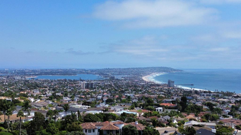 This lovingly cared-for home boasts panoramic whitewater ocean views, bay and city vistas, and dazzling firework shows. Nestled in a quiet cul-de-sac in La Jolla, this property offers an incredible opportunity to make it uniquely yours. Perfect for hosting gatherings, the outdoor space features a pool, spa, and various amenities designed for leisure and entertainment. The property comes with owned solar panels, providing sustainable and cost-efficient energy. Situated in a serene and private cul-de-sac, offering peace and tranquility. Don't miss out on this rare piece of property where you can create your dream home in one of La Jolla's most coveted locations.