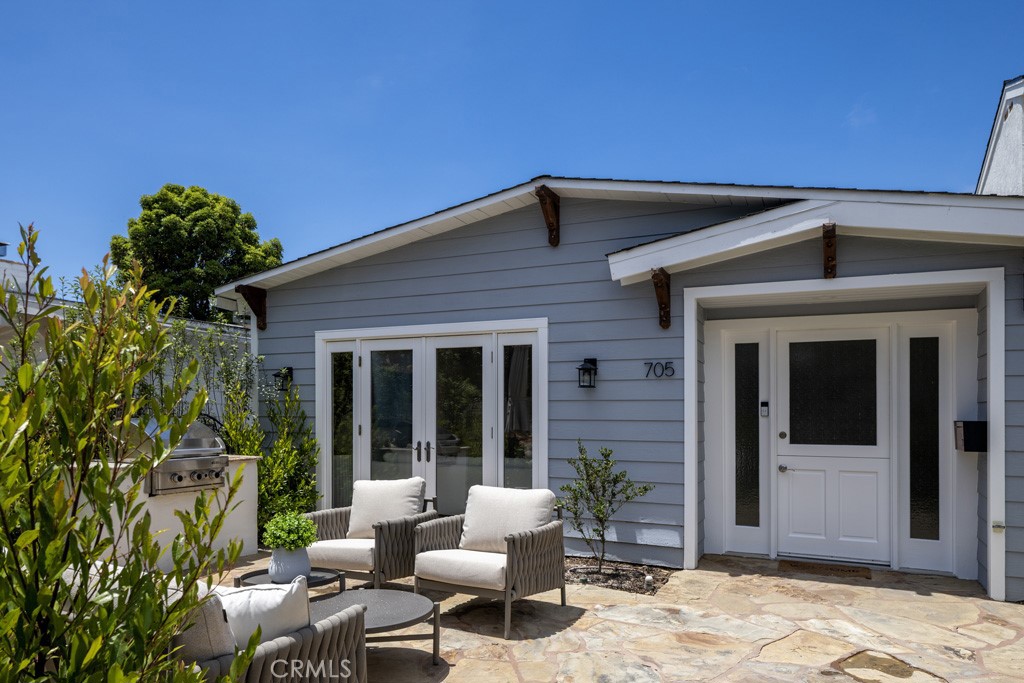 Located in the highly sought-after Village of Corona del Mar, this beautifully maintained front-unit cottage blends coastal charm with everyday ease—all on a single, convenient level. With three spacious bedrooms and two bathrooms, the home feels bright, open, and instantly welcoming. Abundant natural light fills the living areas, bringing out the home’s warm finishes and timeless details. The open-concept layout creates an easy flow from the living room to the front patio—perfect for morning coffee, casual dinners, or simply relaxing with friends. The kitchen is well-appointed and connects seamlessly to the dining and living spaces, making entertaining a breeze. Tucked along a tree-lined street and just a short stroll to the beach, local cafés, restaurants, and boutique shops of PCH, this home offers a rare opportunity to enjoy Village living in one of Corona del Mar’s most cherished neighborhoods—with the added comfort of single-level living.