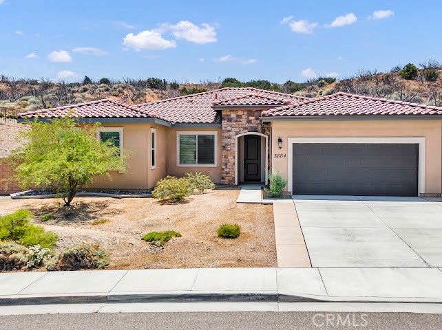 Beautiful Mountain View Home in the Secluded Joshua Ranch Gated Community in West Palmdale* Tile Roof & Arched Porch*Appealing Drought-Tolerant Landscaping*Upgraded LED Lighting & Ceiling Fans*Luxury Vinyl Flooring*Spacious Gathering Rooms*Gourmet Kitchen w/Custom Granite Counters, Quality Appliances, Farm-House Sink, Butler's Pantry*Walk-In Pantry*Massive Center Island w/Bar Stool Seating & Opens into Spacious Family Rm*Ideal Bedroom w/Master Bathroom w/Walk-In Closet, Soaking Bathtub, Large Shower & Dual Vanity*Comfortable Size Secondary Bedrooms*Outdoor Patio Stunning Desert Views*Over-Sized 2-Car Garage w/*Perfect Home for Entertaining *Solar in no Balance . Nearby Hiking & Biking Trails*Nearby Aqueduct Fishing*A True Gem Combines Exquisite Upgrades in a Picturesque Setting Provides for a Unique Living Experience