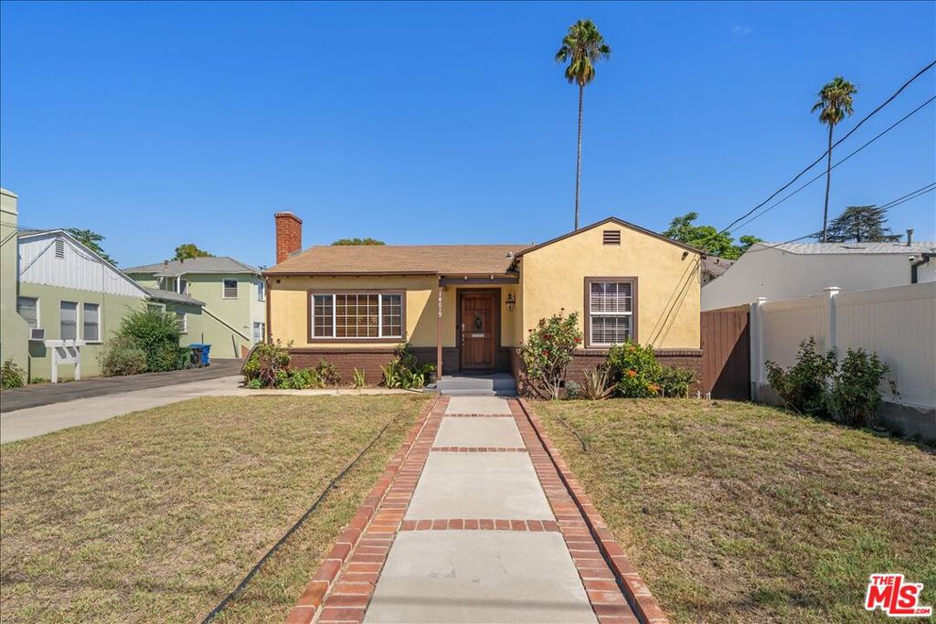 The Perfect Valley Glen home for today's savvy buyer. This very-well-cared-for home features a large, remodeled kitchen with stone countertops, stainless steel appliances and high end laundry. There's also a spacious living room with fireplace & recessed lights and a formal dining room with a newer sliding door for easy access to the gorgeous backyard. There are hardwood floors throughout the home, two comfortable bedrooms, a full bathroom with tub and shower, and newer dual pane windows in every room. Also features newer central AC & Heating. Huge Bonus: There is a large detached guest house off the spacious, fenced backyard. The guest house features a large living space, good-sized kitchen, another bonus room, and bathroom with stall shower. This flexible space is perfect for extended family, home office and more. There is another finished flexible space behind the guest house with a half bath. Perfect for private office. Additionally, there's a freestanding custom built storage/utility shed on a concrete slab at the rear of the property with plenty of room for power tools, lawnmower, and more. The home features a long driveway with parking for up to 3 vehicles. The entire house and bonus house exterior were freshly painted this year. The home is super close to the Orange Line Busway and local dining & shopping. Move-in ready. The property is Zoned LARD2!
