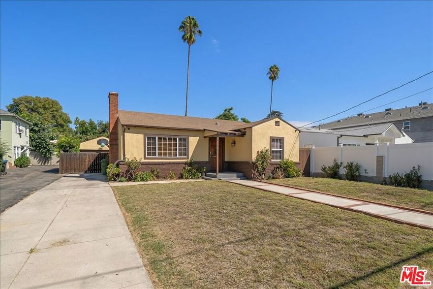 Excellent Valley Glen family home with a detached 1-Bedroom 2- Bathroom guest house. The main home features a large, remodeled kitchen with granite countertops, stainless steel appliances and high end laundry. There's also a spacious living room with fireplace & recessed lights, and a formal dining room with a newer sliding door for easy access to the huge backyard. Hardwood floors and newer dual pane windows throughout, two comfortable bedrooms, and a full bathroom with tub and shower. The home also features a newer central AC & Heating system. The large detached guest house features a spacious living room, bedroom, good-sized kitchen, and a bathroom with stall shower, plus an additional room with a half bath. Perfect for supplemental income, extended family and home business opportunities. There's a freestanding custom built storage/utility shed on a concrete slab at the rear of the property with plenty of room for power tools, lawnmower and more. The home features a long driveway with parking for up to 3 vehicles. The entire house and guesthouse exterior were freshly painted this year. Super close to the Orange Line Busway and local dining & shopping. Move-in ready. This property is Zoned LARD2 for incredible developer possibilities!