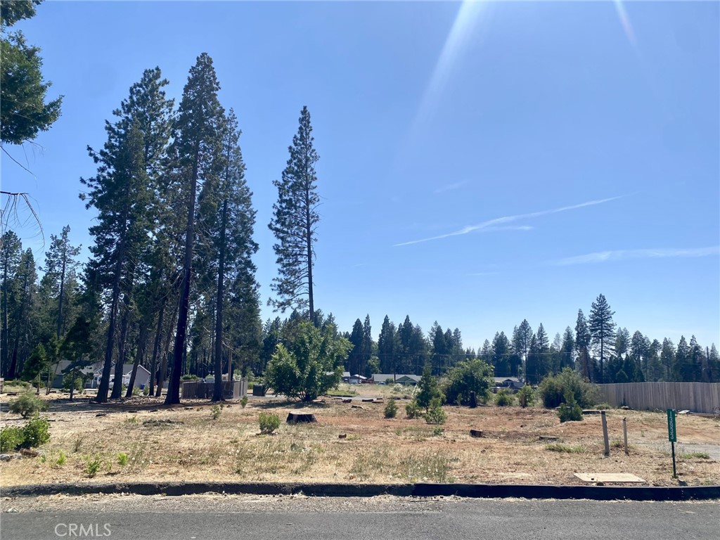 Beautiful quarter-acre lot located on the desirable side of Magalia in the Paradise Pines Property Owners Association. Enjoy all the included amenities such as the clubhouse, swimming pool, disc golf course, and community events. This lot is near the greenbelt and the disc golf course, offering a peaceful setting. The area is seeing new homes being built, making this a great opportunity to build your future home or invest. Come take a look today!