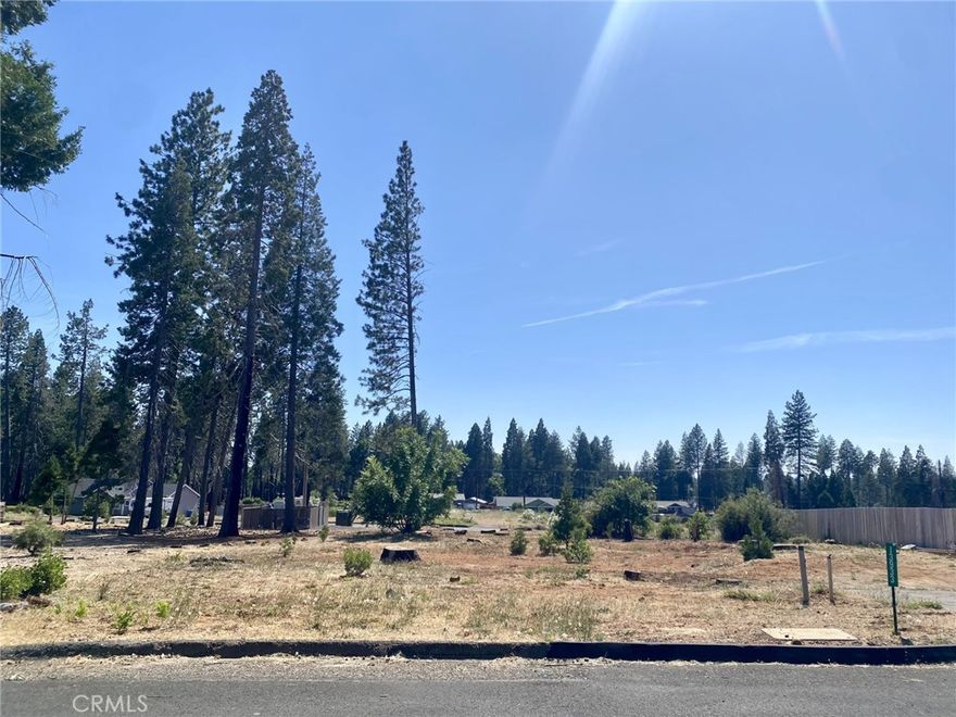 Beautiful quarter-acre lot located on the desirable side of Magalia in the Paradise Pines Property Owners Association. Enjoy all the included amenities such as the clubhouse, swimming pool, disc golf course, and community events. This lot is near the greenbelt and the disc golf course, offering a peaceful setting. The area is seeing new homes being built, making this a great opportunity to build your future home or invest. Come take a look today!