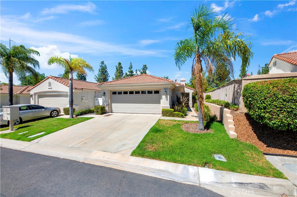 WELCOME HOME to The Oasis, a premier Senior gated community in the heart of beautiful Murrieta! This UPDATED and TURNKEY 2 bedroom, 2 bathroom home with an office/den offers comfort, style, and low maintenance living in a peaceful setting. Step inside to discover a light filled open floor plan with modern finishes throughout, including updated LVP flooring, fresh paint, and a spacious kitchen with stainless steel appliances and ample cabinetry. Enjoy your morning coffee or evening sunset from the private backyard with no rear neighbors, just tranquil views of the greenbelt behind the home. The primary suite features a large walk-in closet with built-ins, and an updated en-suite bathroom with dual sinks. Additional highlights include a cozy living room and an attached 2-car garage. The Oasis community offers resort style amenities, including a clubhouse, pool, spa, fitness center, tennis and pickleball courts, and social clubs, perfect for an active and engaged lifestyle. Conveniently located near shopping, golf, and major freeways. Don’t miss this move-in ready GEM in one of Murrieta’s most sought-after retirement communities!!!