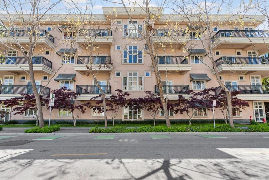 There are a total of 30 units for sale - floor plans and pricing varies. All units on floors 2-4 have balconies. Prospective buyers are encouraged to visit the site and consult with our sales team for detailed information about the specific units being sold. This luxury 4-story building offers resort-style amenities including a pool, hot tub, secure 2-level parking garage w/EV chargers, & Caffe Riace on-site. Built in 1997, this 30-unit community is just blocks away from California Ave dining, shops, and cafes. Features high ceilings, balconies, A/C, & floor-to-ceiling windows in select units. Some include luxury vinyl plank flooring, quartz countertops, & Thermador stoves. Choose from fully renovated units or upgrade an as-is unit using our in-house design. Every unit comes w/dedicated storage & garage parking. Located near Stanford, Caltrain, & major tech employers, this is the perfect blend of convenience, comfort, & lifestyle in the heart of Silicon Valley. Don't miss this rare opportunity to own in one of Palo Altos most desirable communities. The images shown are of a model unit and are for illustrative purposes only. The actual unit may vary in layout, finishes, and features.