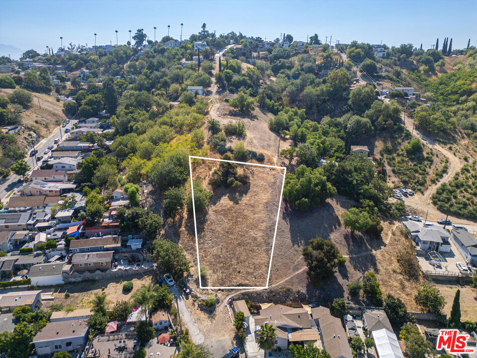 SELLER FINANCING AVAILABLE! - BUILD READY - Comprehensive SURVEY, SOIL, and TOPOGRAPHIC reports completed and IMMEDIATELY AVAILABLE, saving months of time and thousands in upfront costs. This PRIME opportunity in the heart of Lincoln Heights, just 3 miles from Downtown LA and Dodger Stadium, is an EXPANSIVE 9,865 sq ft residential lot with a maximum buildable space of 3,745.91 sq. ft. - it offers sweeping PANORAMIC VIEWS of the DTLA skyline. A gentle slope is perfect for your DREAM HOUSE with a VIEW. Direct street access from Gillig Ave ensures quick connectivity to freeways, public transportation, and LA's top cultural and dining destinations. Surrounded by a VIBRANT community, this is the perfect BLANK CANVAS to design and build your dream home without the usual delays. Don't wait - Call Today!