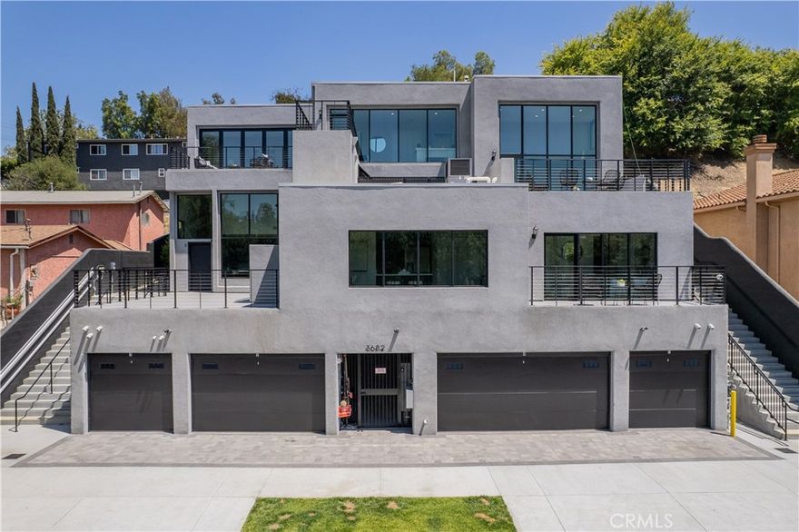 Built in 2025, this 4-unit luxury manor apartment is set within a charming residential pocket of El Sereno. Each residence features its own private terrace with sweeping views of the surrounding mountains and cityscape. Units come fully outfitted with modern conveniences,

including in-unit washer/dryer, refrigerator, stove, dishwasher, and central air conditioning and heating. Offering flexibility for both owner-users—live in one and lease the others—or investors seeking stable passive income, this property represents a rare new-construction.  Non Rent Control.  Owned common area solar panels support eco-friendly living.