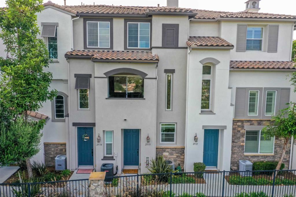 Welcome to 2533 Antlers Way, a stylish three-story townhome located in the desirable Magnolia at Old Creek Ranch community in San Marcos. This thoughtfully designed 2-bedroom, 2.5-bath residence offers approximately 1,173 sq. ft. of comfortable living space with the perfect blend of convenience and resort-style amenities. The entry level features a spacious two-car tandem garage with extra storage—ideal for bikes, surfboards, or outdoor gear. On the main level, you’ll find a bright and open floor plan with a welcoming living room, a well-appointed kitchen, a convenient half bath, and access to a private balcony where you can relax and take in the scenic views. Upstairs, two master suites each include their own private bath, offering comfort and privacy, while a stacked laundry unit provides everyday ease. Life at Magnolia at Old Creek Ranch is all about lifestyle. The community boasts a sparkling pool, children’s pool, soothing spa, and a well-equipped barbecue area—perfect for entertaining and enjoying San Diego’s year-round sunshine. Beyond the gates, you’re minutes from everything North County has to offer. Outdoor enthusiasts will love the nearby hiking and biking trails at Double Peak Park and Discovery Lake, while coastal escapes like Carlsbad and Encinitas beaches are just a short drive away. Enjoy shopping and dining at San Elijo Hills Town Center or explore the vibrant restaurants and entertainment options in Carlsbad Village. Families and professionals alike will appreciate access to top-rated schools, community parks, and easy commuting via nearby freeways.