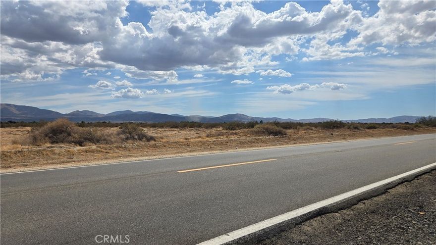 Well located 10 Acres, 9.55 Net Acres, fronting Palmdale Blvd! Excellent potential in the path of progress, this scenic parcel in the Sun Village area has great access with over 600 feet of paved frontage, and electricity available at the street. Nearby to existing neighborhoods, and just under a mile from Littlerock High School, this parcel maintains its rural feel while being minutes away from all the conveniences. Desirable A-2 Heavy Agricultural Zoning makes this a great site for home or ranch, and an easy location for a cross-valley commute. A great buy! *Buyer to make their own independent investigations regarding Zoning and General Plan Designations, Environmental and Hazard Zones, Access and Development costs, Availability and Costs of Utilities.