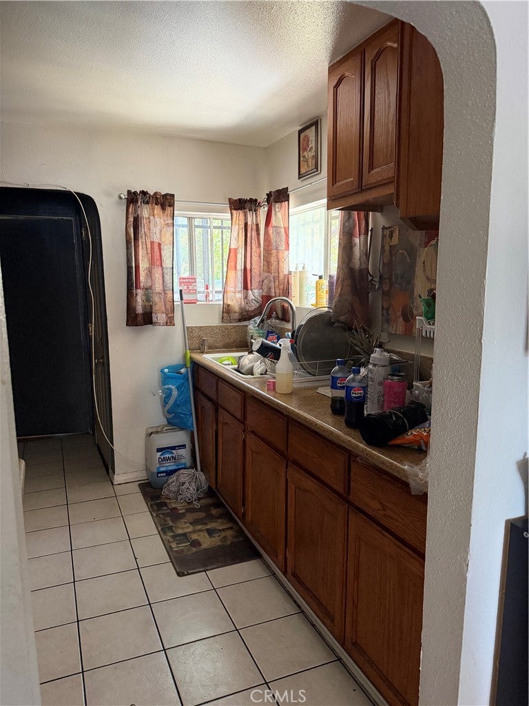 Photo of 315 E 91st ST, Los Angeles, CA 90003 (MLS # PW26172188)