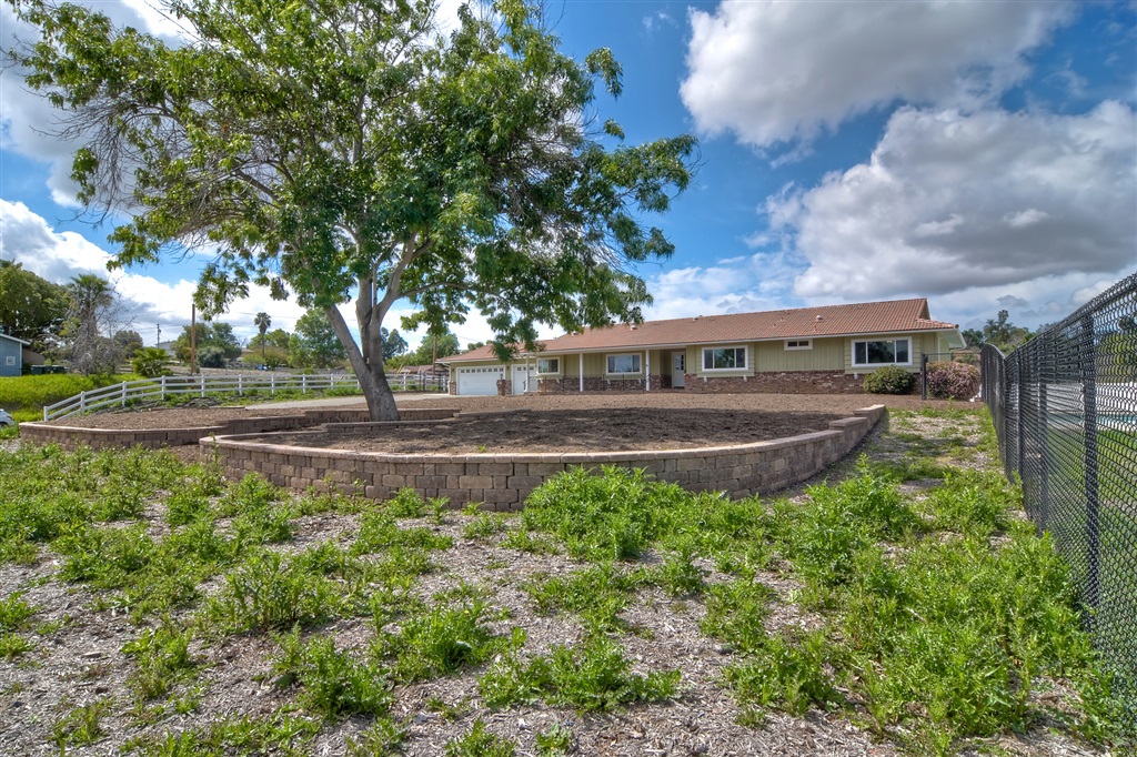 If you are looking for a One story home with a comfortable lifestyle, try this spacious 3 bedroom 3 bath Ranch. 1 acre fenced property in the foothills of Vista. Enjoy the brick fireplace in living room, craft room and dedicated office that can easily be a 4th bedroom. Horses allowed on the mostly level 1 acre property. possibly split into two lots or add a second dwelling. Recent (2016-2019) upgrades include, tile roof, A/C, vinyl windows, solar and 9 solatubes. copper pipes replaced 2016. See Supp. New toilets, new flooring in bedrooms, all 3 bathrooms and laundry room. new interior paint throughout. Distressed pecan stained hickory hardwood floors., whole house fan, 5 ceiling fans throughout, fire place is gas and an internal heatolater, built in cabinets in living room and hall way, new retaining walls, 44X20 in ground pool, new pool pump and controller, 10 X 30 patio and walking ramp, new concrete patio in back yard, solar and plumbing is in place to connect with Vista sewer if desired. house copper piping completely replaced in 2016. New gas water heater and added circulation pump for instant hot water in 2016. Sewer, gas and electric plumbed to support a pool house if desired.. Neighborhoods: Vista Other Fees: 0 Sewer: Septic Installed Topography: GSL