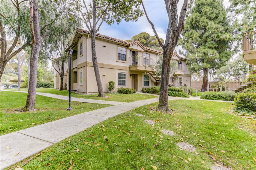 Move-in ready, ground level, great location in complex with large green belt area. Community pool, spa and gym. Conveniently located for access to I-15, Hwy 56, bike paths, and shopping center. One assigned covered parking space (# 84) and one unassigned guest parking space (permit required). New sliding glass door, new windows, new paint, new flooring, recessed lighting, in unit washer and dryer, cozy fireplace. Large walking master closet, fans in the master bedroom, guest bedroom and living room. Complex Features: ,,,,,, Equipment: Dryer, Washer Other Fees: 0 Sewer: Sewer Connected Topography: LL