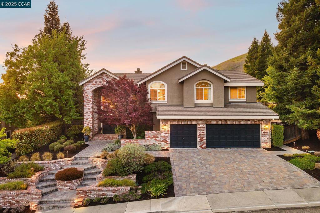 A beautifully updated & expanded Northridge home situated against open space offering privacy & views! A grand foyer leads into the formal living room w/soaring ceilings, windows framing the backyard & a dual-sided fireplace. The formal dining room showcases a built-in buffet cabinet & backyard access. Hardwood floors flow into the gourmet kitchen designed w/a breakfast bar island, granite counters, SS appliances & dining nook. The spacious family room has a built-in desk & second fireplace. A powder room is located next to the bar area on the main floor. The luxurious primary retreat features vaulted ceilings, sitting area & a gas fireplace. The remodeled ensuite bath boasts dual sinks, makeup vanity, tub, oversized walk-in shower & a custom walk-in closet. A junior suite w/private bath & 2 additional front-facing beds sharing a hall bath complete the upstairs layout. Highlights: Built in speakers downstairs, new interior paint/fixtures & mud/laundry room. In your backyard, enjoy the PebbleTec pool & spa, built-in trampoline, expansive paver patio, lawn, & pavilion w/speakers & fireplace. The outdoor kitchen is equipped w/a built-in BBQ, bar seating, mini fridge, side burner & warming drawer. Close to trails, Blackhawk Plaza, top-rated schools & community amenities.