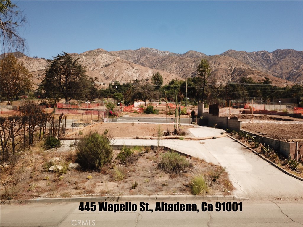 An opportunity awaits to build your dream home or a profitable investment property in a serene Altadena location. This 7,026-square-foot lot, once home to a 2-bedroom, 1-bathroom residence, is now a blank canvas with endless potential, awaiting your vision. Nestled in a tranquil street with the stunning San Gabriel Mountains as a backdrop, this property offers a rare sense of peace and quiet. Despite its secluded feel, it’s just moments away from local amenities. You're a short distance from Farnsworth Park, where you can enjoy summer concerts, and just a quick drive from the shops and restaurants on Lake Avenue. The vibrant energy of Old Pasadena and the Playhouse District is only 15 minutes away, offering the best of both worlds. The lot is ready for development, with Phase 1 and Phase 2 debris removal already completed. Adding to the value, the owner received plan approval to build a 300-square-foot ADU in 2021. This is a drive-by only listing—please do not enter the property. Prospective buyers are responsible for all due diligence regarding building requirements, permits, and the restoration of utilities.