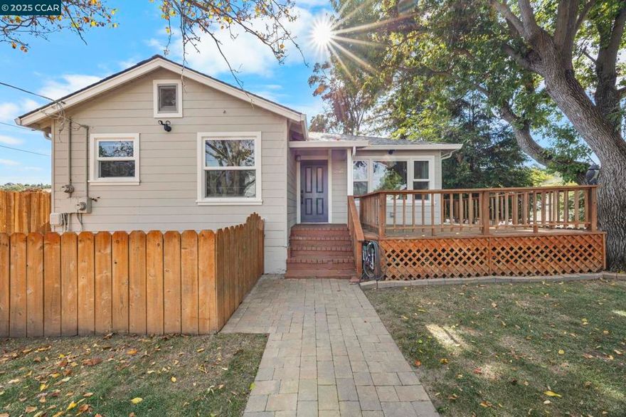 All offers encouraged, Contingent, FHA/VA - Great opportunity to own a beautifully updated home with income potential! Perfect for multi-generational living or generating rental income, this versatile property includes a main residence, a finished lower-level studio, and a separate, fully updated cottage.  Enjoy peaceful mornings on the shaded front porch.   The main home features 2 spacious bedrooms and 1 full bath, a light-filled eat-in kitchen with stainless steel appliances, pantry, recessed lighting, and a whole house fan. Downstairs, a finished studio with its own entrance, kitchenette, and full bath can be used as an extension of the main home or as a private rental.  The detached cottage has been tastefully remodeled, offering a full kitchen, updated bath, and separate gas and electric meters for added convenience.  Additional features include: Dual-pane windows throughout -  Newer roofs and gutters on both structures - Ceiling fans in every bedroom