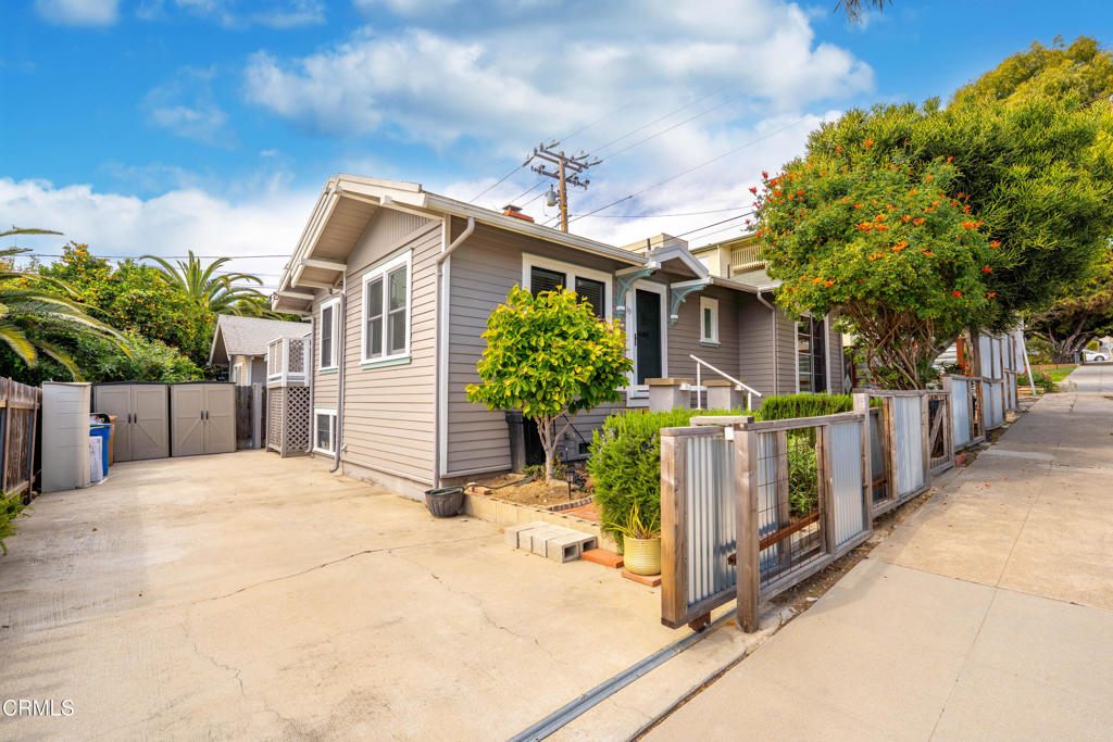 Fantastic Downtown Bungalow!Step into 1922 architectural charm with wood floors, a cozy fireplace, and light-filled spaces -- all just minutes from shops, dining, and the beach. This 2-bedroom, 2-bath home offers 1,238 sq. ft. plus a 9' x 19' office/storage space below. Modern upgrades include owned solar, new A/C, updated electrical panel, water softener, reverse osmosis, seismic retrofit and new water heater. Seller is providing their own home, sewer lateral, and termite inspections for peace of mind. Pictures are pre- tenant move-in--when viewing you will see home totally furnished. No garage.