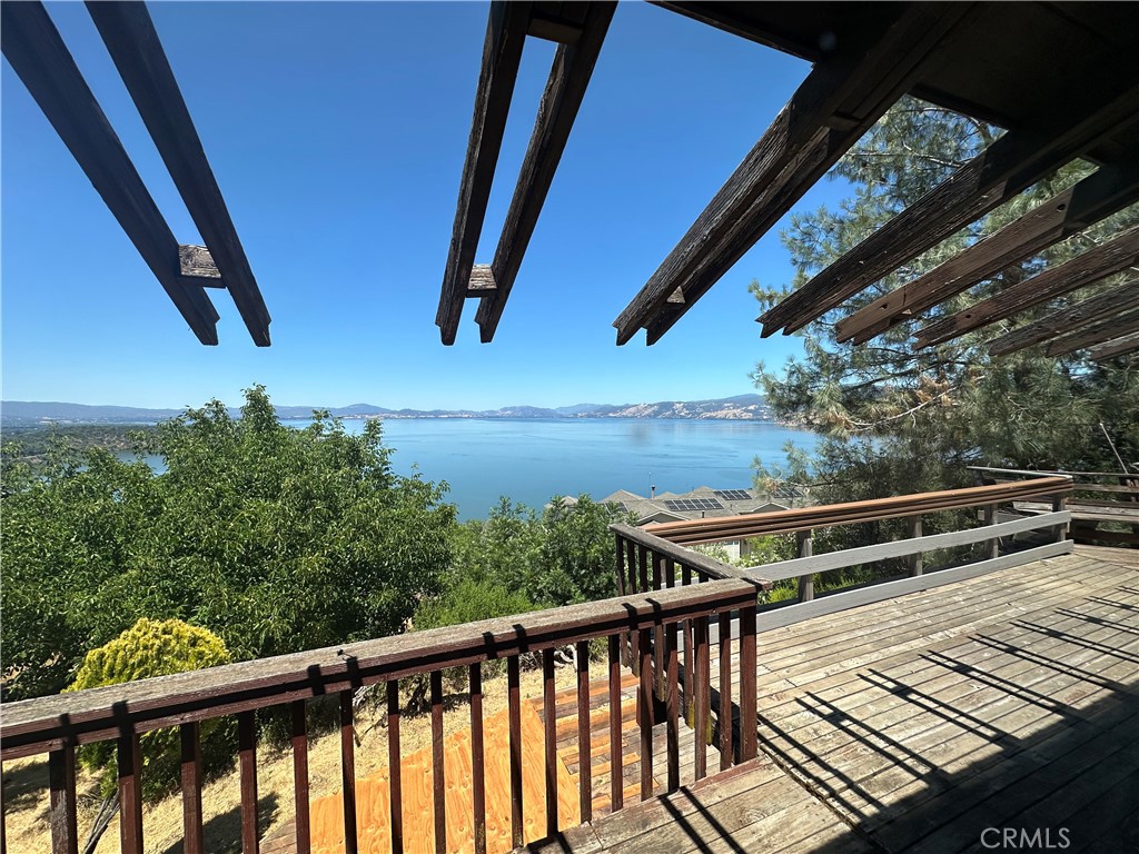 Nestled in Kelseyville on a well-appointed 0.47-acre parcel, With Spectacular View of Clear Lake, this spacious two-story home spans 2,908?sq?ft of living area and features 2 bedrooms and 2.5 bathrooms. Built in 1981, the residence offers a generous floor plan, an attached garage accommodating up to SIX vehicles, and is zoned for residential use in the Riviera Heights subdivision. The property sits on public water service with septic disposal.