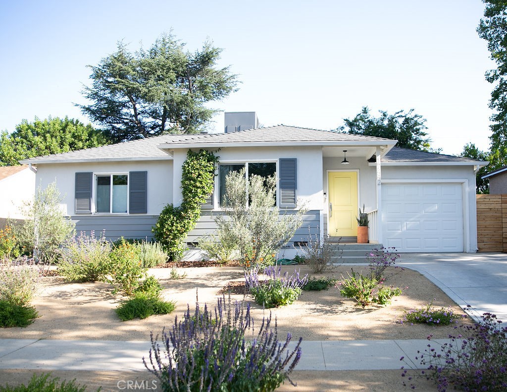Highly Desirable Encino Park Gem! This charming home has been lovingly cared for and meticulously maintained over the years. Built for modern living and ideally situated in the heart of Encino, this bright and stylish 3-bedroom, 2-bathroom home offers both comfort and versatility on a quiet, tree-lined street. Step inside to discover an open-concept layout with hardwood floors throughout and newly installed fixtures. The eat-in kitchen opens directly to a tree-filled, private backyard, blending thoughtful updates with seamless design for a truly elevated living experience. The kitchen is open and airy, featuring stainless steel appliances, a bright quartz center island, a farmhouse sink, and a cozy sitting area. At the rear of the home sits the spacious primary suite, surrounded by lush greenery. It includes a walk-in closet and an en-suite bathroom with dual sinks, a walk-in shower, and a large soaking tub. Two additional generously sized bedrooms, a full second bathroom with a tub, and ample storage complete the main home. An attached one-car garage adds even more functionality and storage space. Located just moments from the best of Encino, enjoy weekend strolls to Balboa Park or quick trips to the beloved food institutions and new popular restaurants popping up along Ventura Blvd—an area quickly becoming one of the most desirable and dynamic neighborhoods in the San Fernando Valley. With trendy cafés, boutiques, and scenic parks all within reach, this is a rare opportunity to own a stylish, multi-functional home in one of LA’s most sought-after communities. This home won’t last—don’t wait! Come see it today!