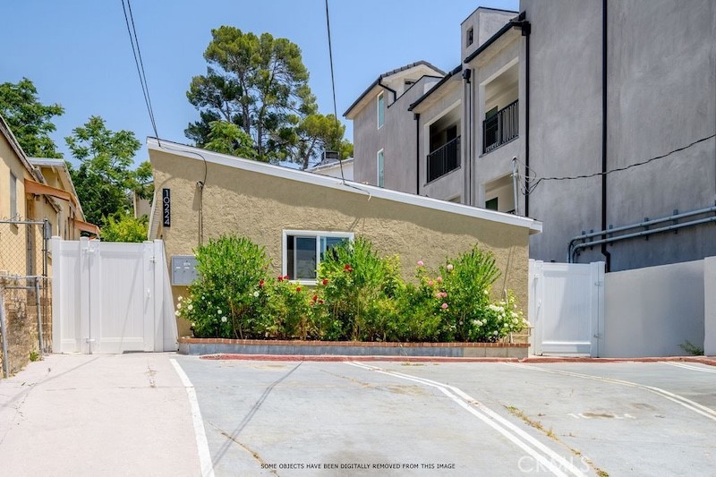 Turnkey investment opportunity! Completely renovated triplex in the up-and-coming Tujunga neighborhood, generating approximately $6,000 in monthly rental income. All units have been updated with new double-pane windows, kitchens, bathrooms, flooring, interior and exterior paint, tankless water heaters, brand-new split AC systems, and separate gas and water meters. The property also features new fencing throughout, six parking spaces (three tandem), and a large backyard with potential to add an 800 sq ft ADU—possibly creating two additional units (buyer to verify with city). Conveniently located near parks, schools, and shopping centers, this is a rare opportunity in a rapidly developing area.
