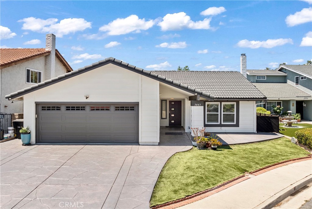 Adorable single story home located on a Cul-de-sac in the desirable Shadow Oaks. True Pride-of-Ownership,
this spacious home offers a thoughtful, open floor plan that includes a cozy living room with vaulted ceilings, dining area and huge counter/bar area. Three ground level bedrooms and 2 full bathrooms. The layout combined with the outdoor set up, gives the feeling of indoor/outdoor living- perfect for both entertaining and extended families.
Upgrades include:
Central A/C, Dual pane windows, Flooring and fresh paint inside/out, Updated kitchen with island, Upgraded electrical panel, and solar panels. This home is impeccable!
The grounds include, detached 2-car garage with direct access, and a beautiful backyard with lushous mature tropical trees/privacy hedges and a patio/BBQ area. Priced to sell, this home is a definite must-see!