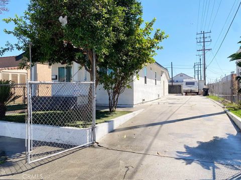 Photo of 1118 E 77th Pl, Los Angeles, CA 90001 (MLS # DW26061581)
