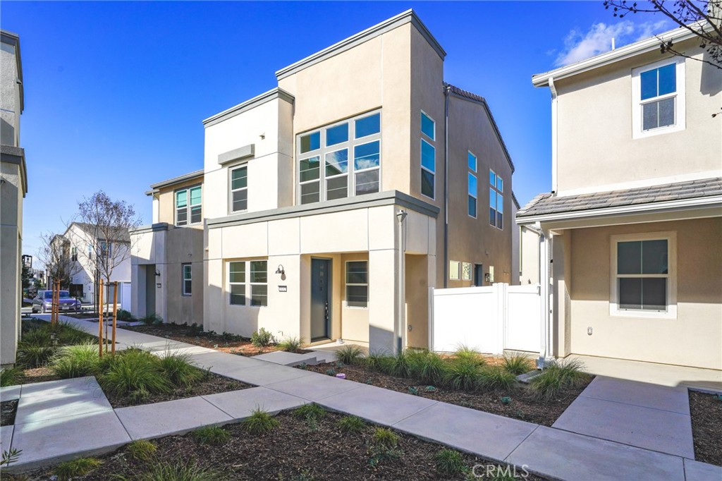 Welcome to Rienda Village!
This beautiful energy-efficient smart home offers modern living with an abundance of community amenities. Featuring 3 bedrooms, 2.5 baths, and a spacious upstairs loft, the open-concept floor plan is highlighted by soaring ceilings and abundant natural light.
The home comes complete with a washer and dryer, refrigerator, microwave, and dishwasher, making it move-in ready. Additional upgrades include paid-off solar panels, a tankless water heater, window blinds, artificial turf in the side yard, and a two-car garage with generous storage space.
Enjoy resort-style amenities in the vibrant Rienda community, including a pool, playground, fitness center, tennis courts, clubhouse, BBQ grills, fire pits, and scenic trails. Conveniently located near shopping outlets, marketplaces, golf courses, and parks—this home combines comfort, convenience, and lifestyle all in one.