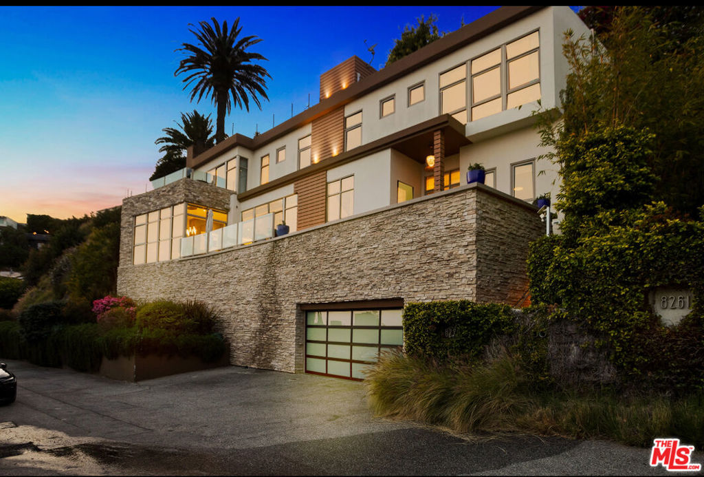 Dazzling city lights view above the Sunset Strip adjacent to the Chateau Marmont. Constructed in 2001 but recently updated with new baths and a luxurious Poggenpohl Kitchen. Inlaid tiger wood cabinetry, Miele and Sub-Zero appliances with induction cooktop, and custom lighting. Two gas fireplaces. 3 Bedrooms, possibly dual primary Bedrooms, 3 baths. Rooftop entertaining deck with outdoor kitchen, custom spa, cabana and outdoor shower. Over 1,500 SF of outdoor terraces plus pool with 270 degree view of the city. Direct entry to secure garage with elevator to the main level. 12 foot ceilings in living area with open floor plan Living/Dining/Entertainer's Kitchen. Floor to ceiling windows with panoramic views from of downtown to Palos Verdes and Catalina from every room. Magnificent attention to detail and adherence to the architect's original vision. Available short term (inquire about price) & long term plus utilities.