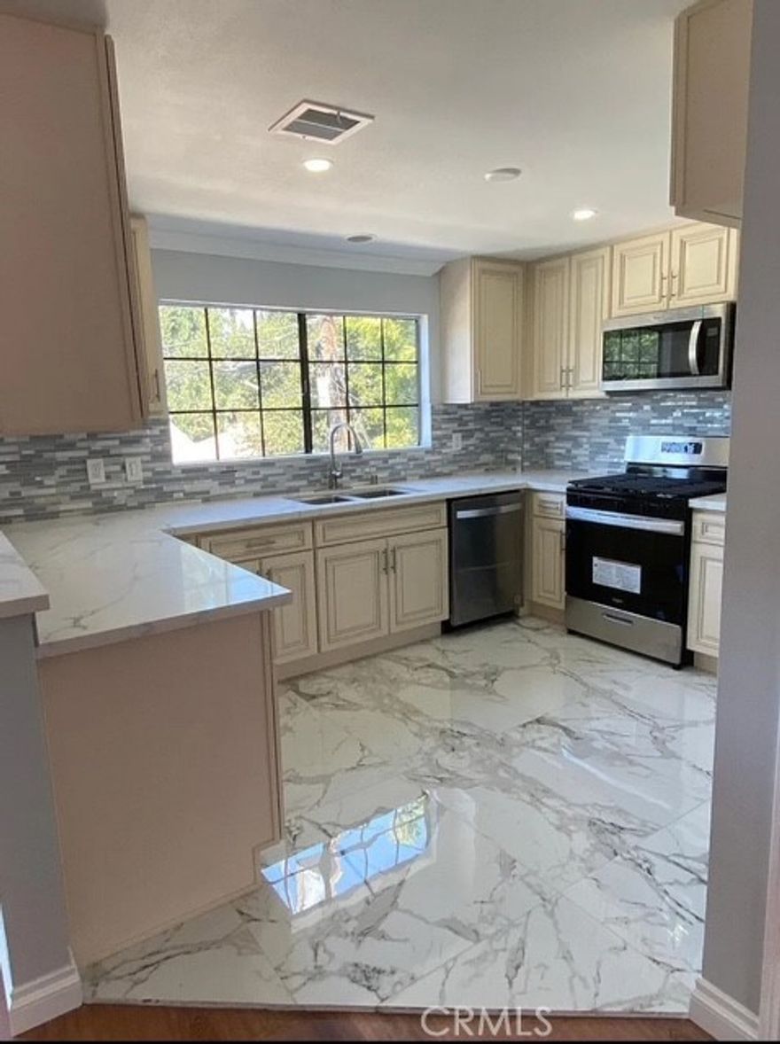 This gorgeous 2 bedroom 2 bath 900 Sq ft ADU Unit has all the upgrades. Kitchen has stainless steel appliances, Quartz countertops, mosaic tile backsplash . Living room has vinyl flooring. Bathroom has been beautifully upgraded. This unit is located in the prime location of Woodland Hills, close to shops, restaurants and freeways. 
It's a must see!

Renting requirements: 1 year lease, credit score has to be 680 +, income has to be 2.5 X the rent. Small pets are ok upon approval.
Please call or text listing Agent to schedule a showing!