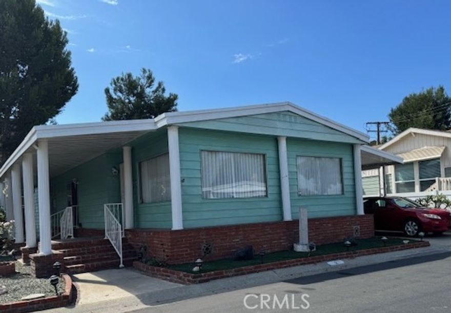 This home is in a very desirable 55/55 Senior Community.  It offers beautiful landscape,  Community Clubhouse, Pool and Spa.  Located close to shopping, transportation and more!  The home has a much desired open floor plan and was owned by "Mrs. Clean", don't wait, it will not last!   The living room is light and bright with  large picture windows!  The separate dining room has a built in cabinet with glass door's and plenty of storage for  China and special items.  The open kitchen offers plenty of upper and lower cabinets.  Wrap around counter could accommodate extra seating.  Gas cooktop, oven, dishwasher and refrigerator with ice maker are all included.  Separate adjoining family/bonus room with extra eating area.  The family/bonus area has a sliding glass door leading onto the patio  The spacious primary bedroom has a large mirrored wardrobe and a private bath.  The guest bedroom has a beautiful oak pull down Murphy bed which provides accommodations for guests but still use this space for an in home office with plenty of room for a desk.  The laundry room has plenty of cabinet space, the washer dryer and trash compactor are included. Central heating and Air!!



Separate but attached to the main home is a (approx.) 308 sq. ft. work shop.  The unique private area has a work bench, sliding cabinets, refrigerator, and freezer.  There is also a spacious free standing shed.  



Four beautiful fruit trees, Orange, Lemon, Lime and Tangerine!! Large carport !!!!





This house is MOVE IN READY!!!!!