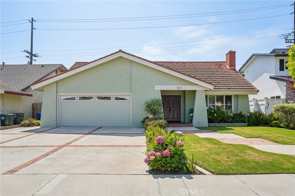 Welcome to 511 Faye Lane, nestled in the sought after pocket neighborhood of Pacific Estates in South Redondo Beach. This inviting single-level home features 3 bedrooms, 2 bathrooms, and a versatile sunroom that opens to a private backyard, perfect for relaxing or entertaining. Step inside to a welcoming foyer that flows into a sunken living room with a cozy fireplace. To the left, the bright family room connects seamlessly to the kitchen, offering direct access to the attached 2 car garage for everyday convenience. Down the hallway, two spacious bedrooms share a large hall bath, while the private primary suite is tucked away at the end, complete with its own en-suite bathroom. Well maintained and move-in ready, the home offers A/C, wood floors, plantation shutters, newer appliances, and an updated kitchen. Ideally located just moments from the beach, Wilderness Park, top rated Redondo schools, and the shops and dining of Riviera Village, this home offers the best of coastal living in one of South Redondo’s most desirable neighborhoods. This home is waiting for you to make it your own!